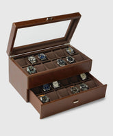 Unlock the TAWBURY Bayswater 24 Slot Watch Box with Drawer in a luxurious brown vegan leather finish, unveiling two levels of diverse wristwatches perfect for avid collectors.